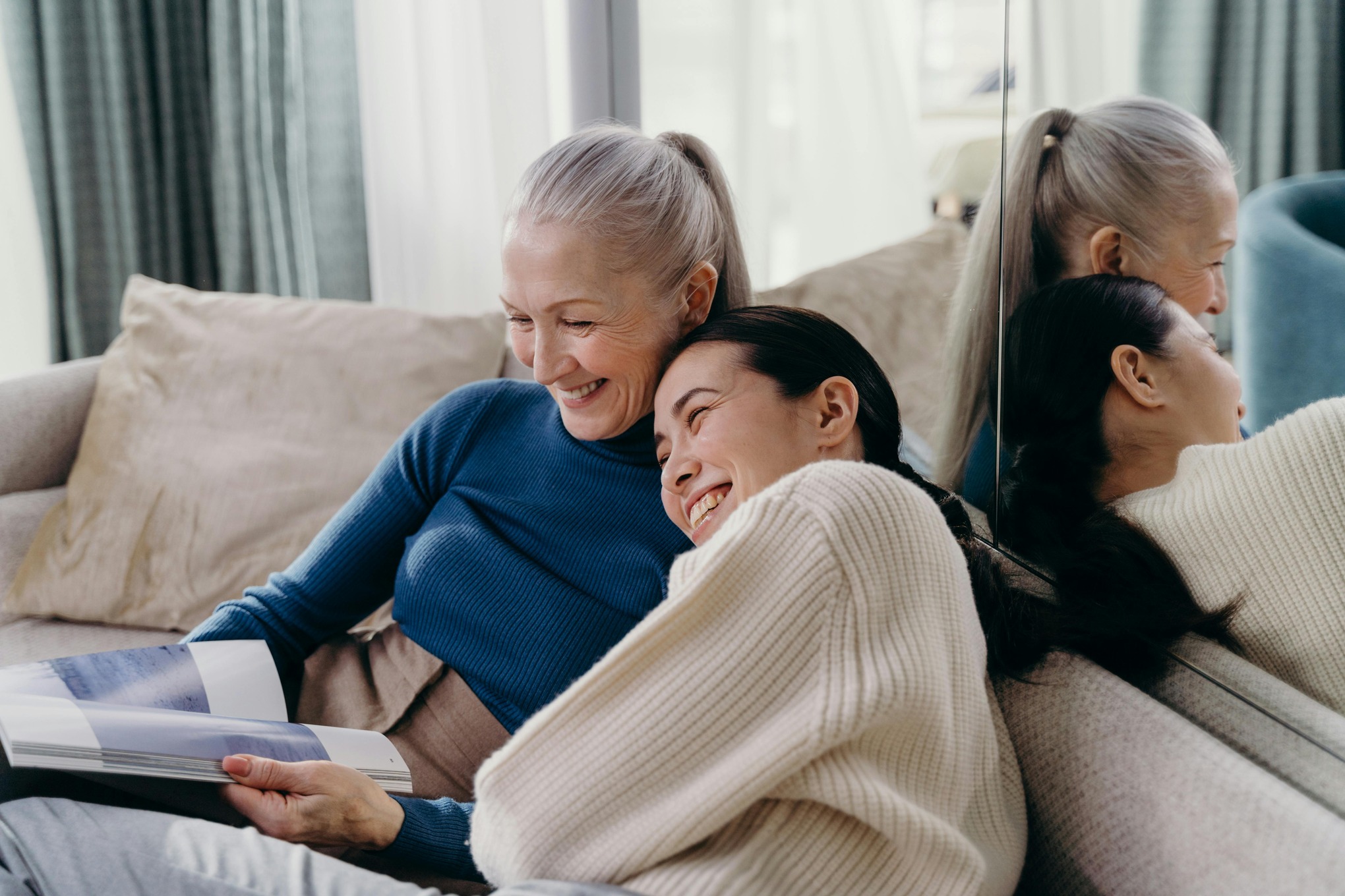 Smiling elderly resident in a cozy, home-like setting